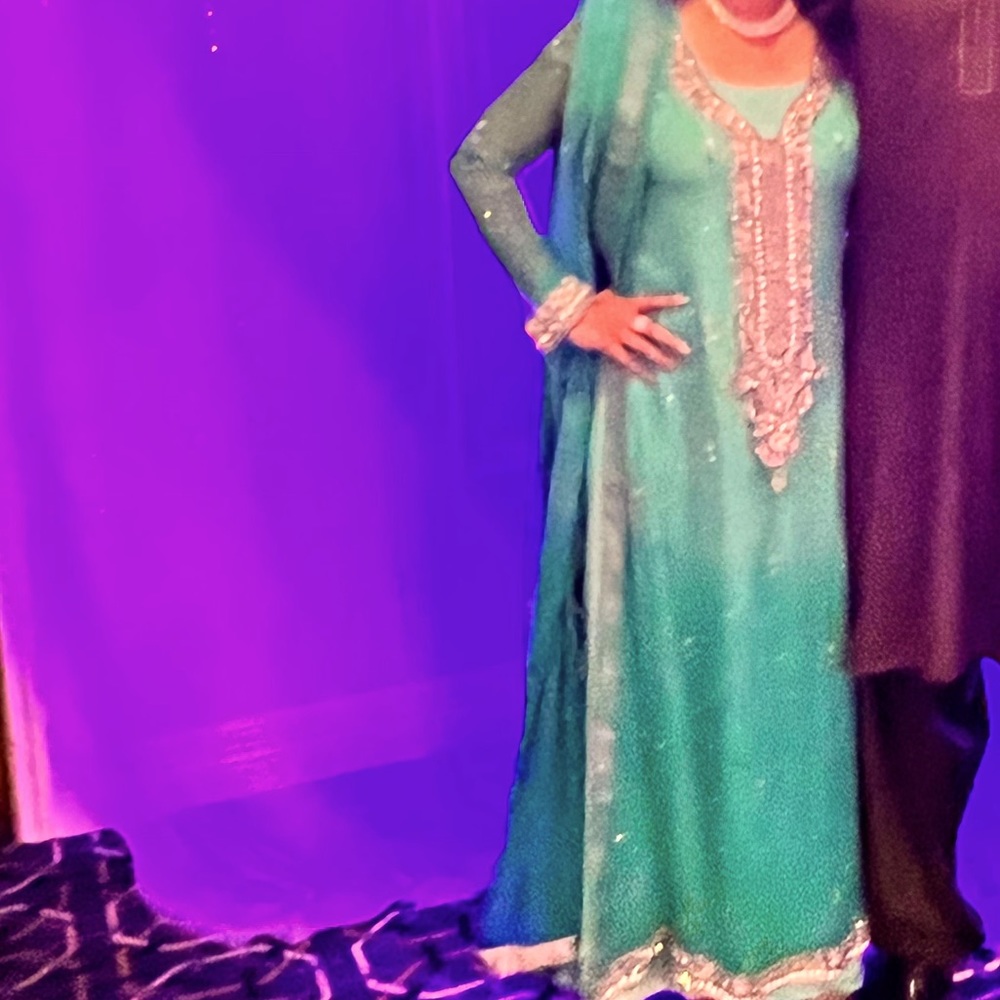 Traditional south Asian dress that comes with a dupatta (scarf )